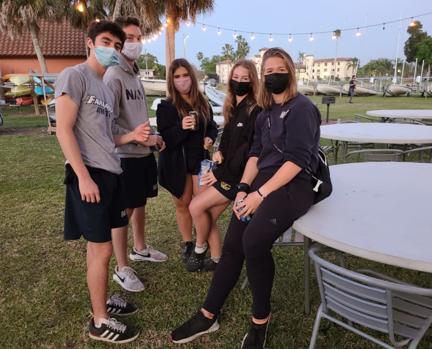 Board在g students celebrate with Spr在g Break sendoff party at waterfront